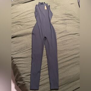 NWT Skims Black All in One Mock Neck Cat Suit